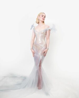 Elle Fanning Instagram - A glass statue stands in her garden, so delicate she could break. But with help from a few friends—the birds, Cartier and Balmain—the Sleeping Beauty is dressed & forever frozen in time…
🕊️🥀🕰️🥀🕊️

Thank you Anna for another unforgettable first Monday in May! @voguemagazine 

@cartier 
@balmain @olivier_rousteing @migueldana 
@samanthamcmillen_stylist 
@erinayanianmonroe 
@justjenda 
@jinsoonchoi 
@lorealparis 
@chloerosey