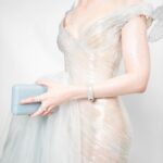 Elle Fanning Instagram - A glass statue stands in her garden, so delicate she could break. But with help from a few friends—the birds, Cartier and Balmain—the Sleeping Beauty is dressed & forever frozen in time… 🕊️🥀🕰️🥀🕊️ Thank you Anna for another unforgettable first Monday in May! @voguemagazine @cartier @balmain @olivier_rousteing @migueldana @samanthamcmillen_stylist @erinayanianmonroe @justjenda @jinsoonchoi @lorealparis @chloerosey