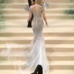 Elle Fanning Instagram - A glass statue stands in her garden, so delicate she could break. But with help from a few friends—the birds, Cartier and Balmain—the Sleeping Beauty is dressed & forever frozen in time… 🕊️🥀🕰️🥀🕊️ Thank you Anna for another unforgettable first Monday in May! @voguemagazine @cartier @balmain @olivier_rousteing @migueldana @samanthamcmillen_stylist @erinayanianmonroe @justjenda @jinsoonchoi @lorealparis @chloerosey