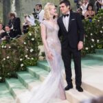 Elle Fanning Instagram - A glass statue stands in her garden, so delicate she could break. But with help from a few friends—the birds, Cartier and Balmain—the Sleeping Beauty is dressed & forever frozen in time… 🕊️🥀🕰️🥀🕊️ Thank you Anna for another unforgettable first Monday in May! @voguemagazine @cartier @balmain @olivier_rousteing @migueldana @samanthamcmillen_stylist @erinayanianmonroe @justjenda @jinsoonchoi @lorealparis @chloerosey