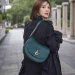 Elva Ni Chen-Xi Instagram - 潮濕的空氣 綿綿細雨讓人不自覺的放慢節奏 偶爾放空一下也不錯哦☁️ #心裡有陽光去到哪裡都是晴天 #elvaootd #burberry @burberry