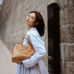 Elva Ni Chen-Xi Instagram - The #PradaGalleria bag’s fresh lightness effortlessly carries away all my worries 🫧 @prada