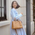 Elva Ni Chen-Xi Instagram - The #PradaGalleria bag’s fresh lightness effortlessly carries away all my worries 🫧 @prada