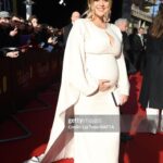 Emily Atack Instagram – Huge thank you @bafta for having me and bump last night ✨ 
Thank you to @ghdhair – what a bloody LOVELY team you all are!
And to @lancomeofficial – The fabulous @messapaulo especially – for hiding my extreme lack of sleep 🫣
And to @thesavoylondon for letting me sample their entire room service menu. 
Dress of dreams was @roland_mouret .. I felt like Princess ruddy Leia 😌