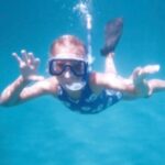 Emily Osment Instagram - HAPPY WORLD WATER DAY (one day late) from your favorite little pisces water baby. I am never happier than when I am surrounded by blue. Get outside and get weird about it! #worldwaterday