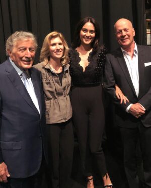 Emma Heming Instagram - We are so saddened to hear of Mr Bennett’s passing. I will personally always remember him for his kind, graceful and gentle demeanor. An evening spent with Tony and Susan was the best NY date night one could ever ask for. 
And his talent, boy his talent—we stand in awe and admiration. I especially applaud the final chapter of his career, as he continued to dazzle and elicit nothing but joy and excitement performing selflessly despite his Alzheimer’s diagnosis. It was a beautiful reminder that we should never allow society to dictate or dismiss anyone because of their cognitive challenges but instead provide the room for them to flourish.
When he hit the stage, he shined and everyone around him beamed! 
Thank you to Mr. Bennett and his family for shining a bright light on this disease. It has and will forever be so meaningful and impactful to me. 
As Mr. Bennett said, “Life is a gift, even with Alzheimer’s.” 💜