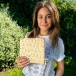 Emmanuelle Chriqui Instagram - I was challenged by @Jews_of_NY to take part in the @UJAfedNY #MatzahChallenge. For every post shared $18 will be donated to UJA! I am wishing you all a happy and healthy Passover. . I’m nominating @noatishby @henmazzig and @bensvegankitchen to this challenge that is dedicated to helping UJA with funding many Jewish organizations in New York, Israel, and the world, and you can have an active part in supporting their amazing work! Photo by @yoavdavis #davismedia