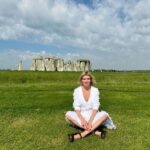 Eugenia Kuzmina Instagram - Happy Mother’s Day ☀️💗🦋 …. Meditating at #stonhenge #mothernature #moon #sun 🌙☀️🌿 #magic …. I don’t post pics of my family anymore on purpose to protect what’s sacred 💜 dress @karnitaharoni_official