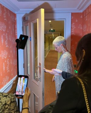Evangeline Lilly Instagram - I know I've been negligent in posting. We had our big UK premier last night and I still haven't posted one photo. It's been pretty full-on and I really just wanted to be present and enjoy my night. Here is a little behind the scenes sneak peek. Last touches before walking out the door. 🚪 

#antmanandthewaspquantumania