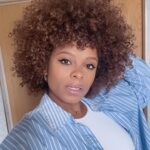 Fleur East Instagram – My curls are popping! ✨➿ And every single product used on my hair in this pic is from my range @thekurlkitchen that was formulated in Ghana with my sis @keshiaeast_ ❤️ I can’t wait for you to be able to use the products in your hair after trying and testing for over THREE YEARS! The entire range is launching this year!! 

Who’s already following @thekurlkitchen ?