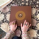 Florence Welch Instagram - Me and @autumndewilde and @thunderwingstudio worked so hard on this and she’s finally here!!! Sharing with you the Dance Fever Deluxe 2LP Vinyl Boxset 🤎 Complete with Dance Fever lyric book, and a new song “Cassandra (Acoustic)” which is only available on the deluxe album 🏹 pre-order now, one week to go x x