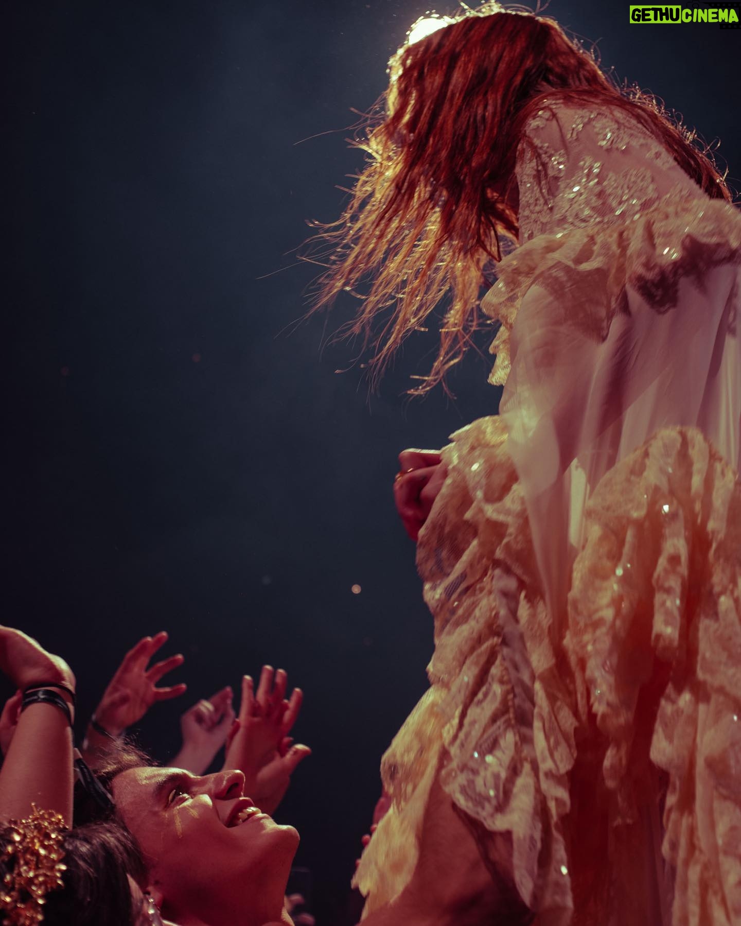 Florence Welch Instagram - Thank you London, gifts of flower garlands and the cursed foot 🌺🩰 @lillieeiger x