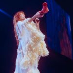 Florence Welch Instagram - Thank you London, gifts of flower garlands and the cursed foot 🌺🩰 @lillieeiger x