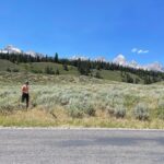 Gabby Barrett Instagram - Happy Birthday to my dear Husband. I snapped this picture today while visiting the beautiful Wyoming state. 2 things I notice: the massiveness & beauty of Gods creation that we get to witness everyday, & a man who God has given to me, to walk the race of life with. Never have I seen or known someone, who would go and pick flowers for his family on his birthday. What a sweet picture of Christ you are. Happy 26th. I love you so much! ❤️ @cadefoehner
