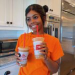 Gabby Douglas Instagram - new smoothie alert pumpkin smoothies have just arrived @smoothieking . oh and there's 5 different kinds w good nutrients and there’s even an option for us vegans. enjoyyy! 🥤🙆‍♀️🧡