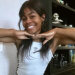 Gabby Douglas Instagram - giving y’all that 2012 smile 👹🖤