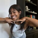 Gabby Douglas Instagram - giving y’all that 2012 smile 👹🖤