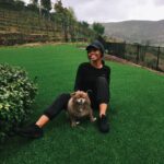 Gabby Douglas Instagram - hoping you all are safe and healthy, sending you all my love. also, cali was mad at me because we took the photo in the rain...