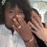 Gabourey Sidibe Instagram - These are our official wedding photos! The Wedding at the kitchen counter featuring our rings by @happyjewelers, followed by an extremely lit reception with Aaron sniffing flowers sent to us and then a very romantic sunset dinner featuring our mask because we were still in the thick of the pandemic. We really do want to have a wedding someday but I just couldn’t wait to marry this amazing man.