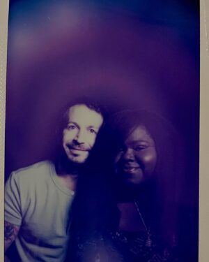 Gabourey Sidibe Instagram - We got our couple’s aura photographed! The purple represents dynamic, powerful, visionary personalities with intuitive knowledge. Blue is caring, nurturing, and protective. The reader said we feel safe and confident with each other. The white orbs represent being connected in a past life, manifestation, and free from personal issues and hang-ups. Nailed it ✨☺️😍💜💙🤍