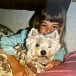 Gemma Atkinson Instagram - Had to dig out some old photos recently as part of filming for our show. Aside from the dodgy decor, the one constant in most of my pictures was Fergie, my first dog and best friend 🥰 I’m so glad mum & dad decided to have her when I was just 18 months old. She helped teach me compassion, kindness, responsibility and the absolute unconditional love dogs have. Sitting writing this sat with Norman & Ollie knowing they’re unknowingly doing the same for both Mia & Thiago makes me smile. 😊 If I had superpowers it’d be to go back to this time again, just for a couple of days… The good ole days ❤️ (I’d also move that wooden pig off the tele asap!) 😂