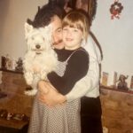 Gemma Atkinson Instagram - Had to dig out some old photos recently as part of filming for our show. Aside from the dodgy decor, the one constant in most of my pictures was Fergie, my first dog and best friend 🥰 I’m so glad mum & dad decided to have her when I was just 18 months old. She helped teach me compassion, kindness, responsibility and the absolute unconditional love dogs have. Sitting writing this sat with Norman & Ollie knowing they’re unknowingly doing the same for both Mia & Thiago makes me smile. 😊 If I had superpowers it’d be to go back to this time again, just for a couple of days… The good ole days ❤️ (I’d also move that wooden pig off the tele asap!) 😂