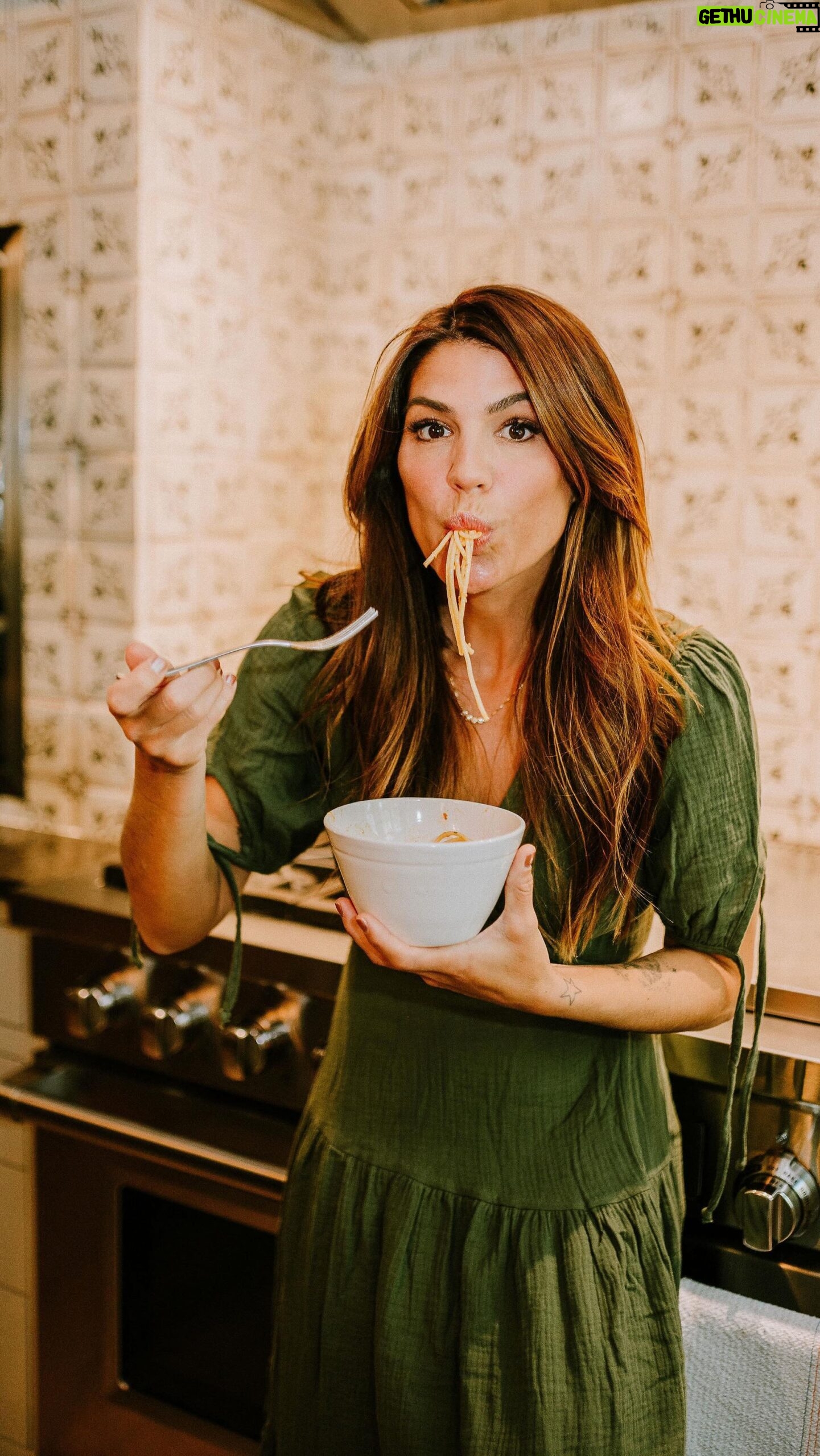Genevieve Padalecki Instagram - when the holidaze hit, nothing beats a warm ’n cozy comfort meal —esp when it involves famed Italian cookbook author marcella hazan’s classic bolognese with sustainable @forceofnaturemeats veggies from the garden. (*non-meat eaters may opt for a @beyondmeat crumble or head to our stories for all-veggie alternative) **another pro/cheat tip from @genpadalecki: cooking the sauce for 2 hrs vs 4 hours came out just fine! ⏲️ nowadays, we recognize that it’s important to be mindful of where & how we source our food. force of nature’s meats are procured through regenerative agriculture, which creates nutrient-rich, tasty food that’s free of synthetics, chemicals, hormones or antibiotics. by supporting sustainable, eco-friendly processes, we can all take part in healing ecosystems & boosting land resilience, making our communities – and the planet itself – healthier. 💪🌎 p.s. keep an eye on our stories for a roundup of our fav cookbooks to help inspire your own holiday meals. 📖🥘👀🎄 marcella hazan’s classic bolognese: 1 tbs oil 3 tbs butter 1 tbs for tossing the pasta ½ c chopped onion ⅔ c chopped celery ⅔ c chopped carrot ¾ lbs ground beef Salt Black pepper 1 c whole milk ⅛ tsp nutmeg 1 c dry white wine 1½ c canned tomatoes, cut up, with their juice 1¼ to 1½ pounds pasta Freshly grated parmigiano-reggiano cheese at the table Directions: 1. Put oil, butter onion in the pot and turn the heat to medium. Cook and stir the onion until it’s translucent, then add the celery and carrot. Cook for 2 minutes, stirring to coat them well. 2. Add ground beef, a large pinch of salt & pepper. Crumble the meat with a fork, stir well and cook until the beef has lost its raw, red color. 3. Add milk & let it simmer, stirring frequently, until it has bubbled away completely. Add nutmeg. 4. Add wine, simmer until it has evaporated, then add tomatoes & stir to coat all ingredients. Simmer, uncovered, for 3 hours or more, stirring from time to time. To keep it from sticking, add ½ cup of water whenever necessary. Stir to mix the fat into the sauce, taste and correct for salt. 5. Toss with cooked drained pasta, adding the tbs of butter, & serve with freshly grated parmesan.