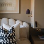 Georgia Hirst Instagram - At home with Actor Gee Hirst 💚 Creating a cosy country-feeling home in London through warming beiges and earthy greens alongside brushed brass finishes, soft layered lighting and thoughtful antique pieces. "When I bought the apartment, it was pretty lifeless and cold. I met my boyfriend who had always fantasied about having a country home and so we started this renovation project together. We introduced warmer tones through the paint colours - all Lick - textiles and finishes to give it a relaxing, 'Soho Farmhouse' countryside retreat feel in the middle of the city." Paint colours used: • Living room, dining and kitchen (walls): #Beige01 • Kitchen cabinets: #Green02 • Staircase woodwork: Green 02 • Bedroom: #Beige02 Soho Farmhouse • Spare room: #Green05 Rome House See the full home tour on the Lick YouTube channel (link in bio) #LickHome #housetour #apartmentdesign