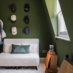 Georgia Hirst Instagram - At home with Actor Gee Hirst 💚 Creating a cosy country-feeling home in London through warming beiges and earthy greens alongside brushed brass finishes, soft layered lighting and thoughtful antique pieces. "When I bought the apartment, it was pretty lifeless and cold. I met my boyfriend who had always fantasied about having a country home and so we started this renovation project together. We introduced warmer tones through the paint colours - all Lick - textiles and finishes to give it a relaxing, 'Soho Farmhouse' countryside retreat feel in the middle of the city." Paint colours used: • Living room, dining and kitchen (walls): #Beige01 • Kitchen cabinets: #Green02 • Staircase woodwork: Green 02 • Bedroom: #Beige02 Soho Farmhouse • Spare room: #Green05 Rome House See the full home tour on the Lick YouTube channel (link in bio) #LickHome #housetour #apartmentdesign