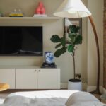 Georgia Hirst Instagram - At home with Actor Gee Hirst 💚 Creating a cosy country-feeling home in London through warming beiges and earthy greens alongside brushed brass finishes, soft layered lighting and thoughtful antique pieces. "When I bought the apartment, it was pretty lifeless and cold. I met my boyfriend who had always fantasied about having a country home and so we started this renovation project together. We introduced warmer tones through the paint colours - all Lick - textiles and finishes to give it a relaxing, 'Soho Farmhouse' countryside retreat feel in the middle of the city." Paint colours used: • Living room, dining and kitchen (walls): #Beige01 • Kitchen cabinets: #Green02 • Staircase woodwork: Green 02 • Bedroom: #Beige02 Soho Farmhouse • Spare room: #Green05 Rome House See the full home tour on the Lick YouTube channel (link in bio) #LickHome #housetour #apartmentdesign