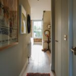 Georgia Hirst Instagram - At home with Actor Gee Hirst 💚 Creating a cosy country-feeling home in London through warming beiges and earthy greens alongside brushed brass finishes, soft layered lighting and thoughtful antique pieces. "When I bought the apartment, it was pretty lifeless and cold. I met my boyfriend who had always fantasied about having a country home and so we started this renovation project together. We introduced warmer tones through the paint colours - all Lick - textiles and finishes to give it a relaxing, 'Soho Farmhouse' countryside retreat feel in the middle of the city." Paint colours used: • Living room, dining and kitchen (walls): #Beige01 • Kitchen cabinets: #Green02 • Staircase woodwork: Green 02 • Bedroom: #Beige02 Soho Farmhouse • Spare room: #Green05 Rome House See the full home tour on the Lick YouTube channel (link in bio) #LickHome #housetour #apartmentdesign