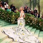 Gigi Hadid Instagram - THOM BROWNE x GARDEN OF TIME, MET GALA It was an honor to represent the work of 70 people in this truly magnificent piece by @thombrowne - definitely worthy of a night (or on display) at the @metmuseum. Thank you always to Anna and @voguemagazine & of course to everyone who put their hands and hearts towards this moment. Grateful to the teams 🐞💛🥀 big love to mine @mimicuttrell @cgonzalezbeauty @laurapolko @nailsbymei