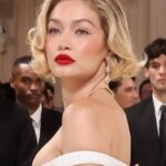 Gigi Hadid Instagram - THOM BROWNE x GARDEN OF TIME, MET GALA It was an honor to represent the work of 70 people in this truly magnificent piece by @thombrowne - definitely worthy of a night (or on display) at the @metmuseum. Thank you always to Anna and @voguemagazine & of course to everyone who put their hands and hearts towards this moment. Grateful to the teams 🐞💛🥀 big love to mine @mimicuttrell @cgonzalezbeauty @laurapolko @nailsbymei