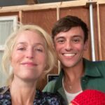 Gillian Anderson Instagram – Wanted to say a huge huge thank you to the darling @tomdaley for knitting this fantastic jumper (and crocheted willy 🌈) for me to wear for our final season of @sexeducation! 🧶🍆

Together we raised just over £12k for @mindcharity, which will be divided amongst 8 local Minds who work with LGBTIQA  communities. Thank you for your stellar knitting skills Tom and for coming to visit me on set! 

Swipe to the end to see the post that started it all (in 2021 🤯)