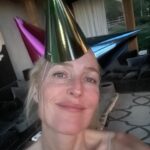 Gillian Anderson Instagram - Thank you to everyone for all my birthday wishes!! And thanks to everybody who participated in the raffle for @sayes.mentoring. Celebrating by testing how many hats I can fit. 😁 xG