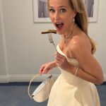 Gillian Anderson Instagram - Sometimes you just need a sausage to go with your yoni dress.
