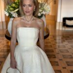 Gillian Anderson Instagram - Sometimes you just need a sausage to go with your yoni dress.