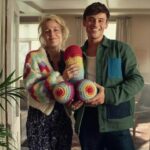 Gillian Anderson Instagram - Wanted to say a huge huge thank you to the darling @tomdaley for knitting this fantastic jumper (and crocheted willy 🌈) for me to wear for our final season of @sexeducation! 🧶🍆 Together we raised just over £12k for @mindcharity, which will be divided amongst 8 local Minds who work with LGBTIQA communities. Thank you for your stellar knitting skills Tom and for coming to visit me on set! Swipe to the end to see the post that started it all (in 2021 🤯)