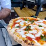 Gino D'Acampo Instagram - Minimum effort, maximum satisfaction. Perfect pizza lunch with the family using @ginopizzaovens … Ovens and accessories are available now at ginopizzaovens.com… 😎 #GinoPizzaOvens #ad #Pizza GDx