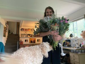 Gracie Gillam Instagram - A gathering of 2021 highlights!

1 - Nat surprising me with a fuck ton of flowers on my birthday as Talia gave me a tarot reading

2 - Making fried green tomatoes (grown in my garden) in Port Washington with Melissa, Tim, Milo, Ruby, Tom and Colette

3 - Ruby casts a sparkler spell on the 4th of July

4 - NYC for Talia’s birthday where they asked the driver to play his favorite music and we all sang Journey together 🎶 

5 - A Virginia beach with my little cousins 

6 - Giving my Mimi a facial while wearing her old outfit 

7 - Evan and Asher play music during Evan’s birthday party

8 - Desert romp with my family as the dogs frolicked among the saguaro cactuses 

9 - Popping a demi bottle of Champagne after Nat popped the question (with a gorgeous Fox and Stone raw emerald ring)

10 - Screenshot from the video Nat got of the proposal (which I won’t post here bc I didn’t know I was being filmed and it’s not PG throughout)