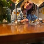Gracie Gillam Instagram - Cremant tasting, mushroom escargot (a.k.a. “Yes-cargot!” - Sarah), and artichokes rockefeller, because my goals for 2021 involve inventing more fun things to do with vegetables. Also making out with my boyfriend more (even if @hildyelizabeth hates it). I threw in a pic of mushroom Wellington from Christmas because: vegetables.