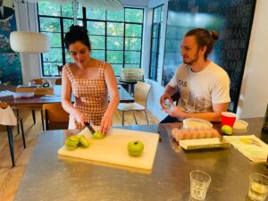 Gracie Gillam Instagram - A gathering of 2021 highlights!

1 - Nat surprising me with a fuck ton of flowers on my birthday as Talia gave me a tarot reading

2 - Making fried green tomatoes (grown in my garden) in Port Washington with Melissa, Tim, Milo, Ruby, Tom and Colette

3 - Ruby casts a sparkler spell on the 4th of July

4 - NYC for Talia’s birthday where they asked the driver to play his favorite music and we all sang Journey together 🎶 

5 - A Virginia beach with my little cousins 

6 - Giving my Mimi a facial while wearing her old outfit 

7 - Evan and Asher play music during Evan’s birthday party

8 - Desert romp with my family as the dogs frolicked among the saguaro cactuses 

9 - Popping a demi bottle of Champagne after Nat popped the question (with a gorgeous Fox and Stone raw emerald ring)

10 - Screenshot from the video Nat got of the proposal (which I won’t post here bc I didn’t know I was being filmed and it’s not PG throughout)