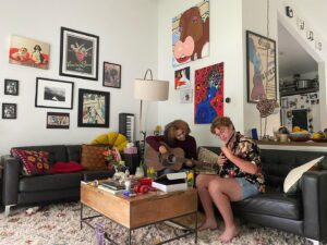 Gracie Gillam Instagram - A gathering of 2021 highlights!

1 - Nat surprising me with a fuck ton of flowers on my birthday as Talia gave me a tarot reading

2 - Making fried green tomatoes (grown in my garden) in Port Washington with Melissa, Tim, Milo, Ruby, Tom and Colette

3 - Ruby casts a sparkler spell on the 4th of July

4 - NYC for Talia’s birthday where they asked the driver to play his favorite music and we all sang Journey together 🎶 

5 - A Virginia beach with my little cousins 

6 - Giving my Mimi a facial while wearing her old outfit 

7 - Evan and Asher play music during Evan’s birthday party

8 - Desert romp with my family as the dogs frolicked among the saguaro cactuses 

9 - Popping a demi bottle of Champagne after Nat popped the question (with a gorgeous Fox and Stone raw emerald ring)

10 - Screenshot from the video Nat got of the proposal (which I won’t post here bc I didn’t know I was being filmed and it’s not PG throughout)