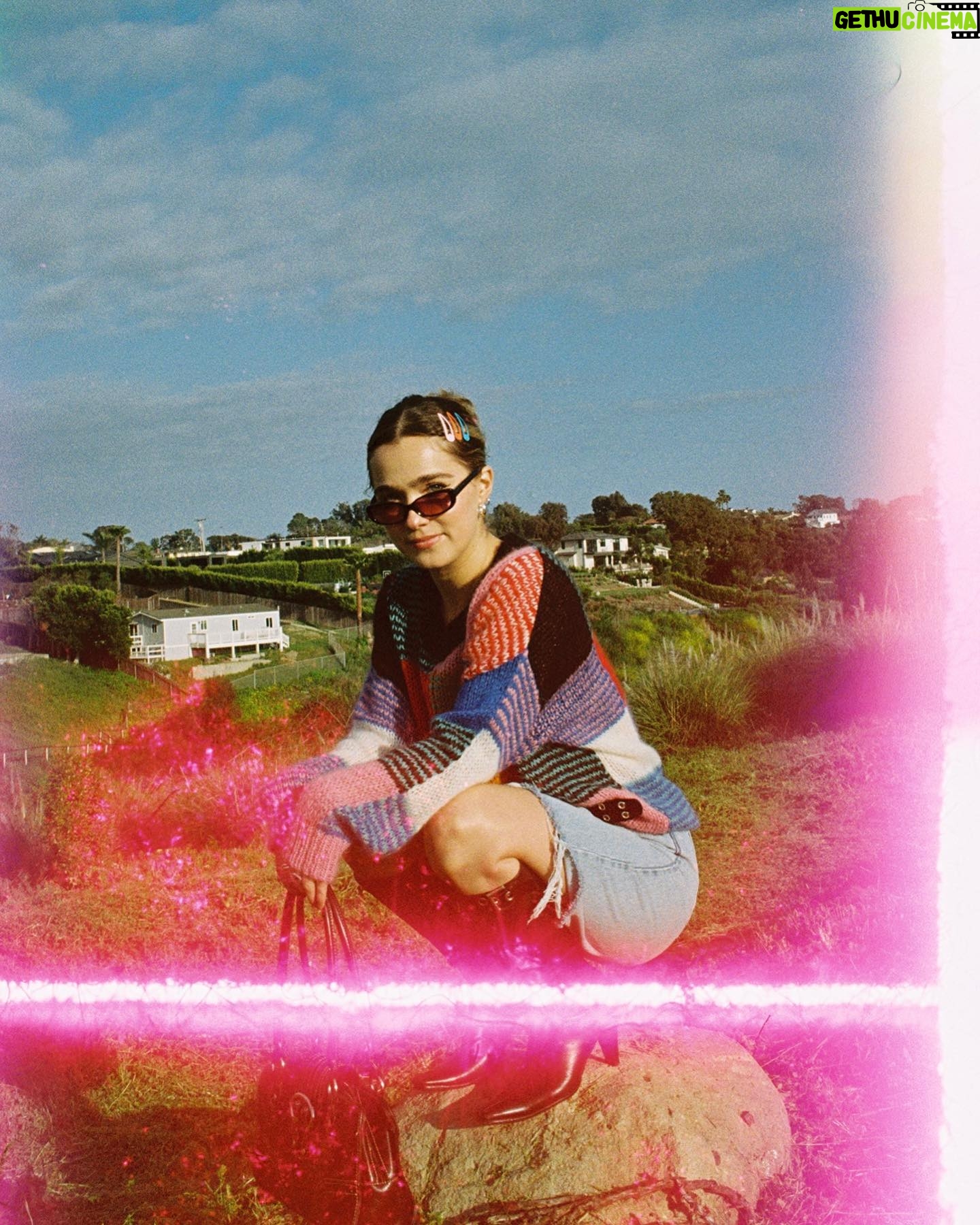 Haley Lu Richardson Instagram - Just me bein silly on a rock and in some flowers wearin a cutie outfit from @thredUP asking you to thrift if you have a shopping addiction like me cause it’s better for the planet and it’s a BLAST peace out babies happy almost earth day weeee!!!!!! #thredUPpartner
