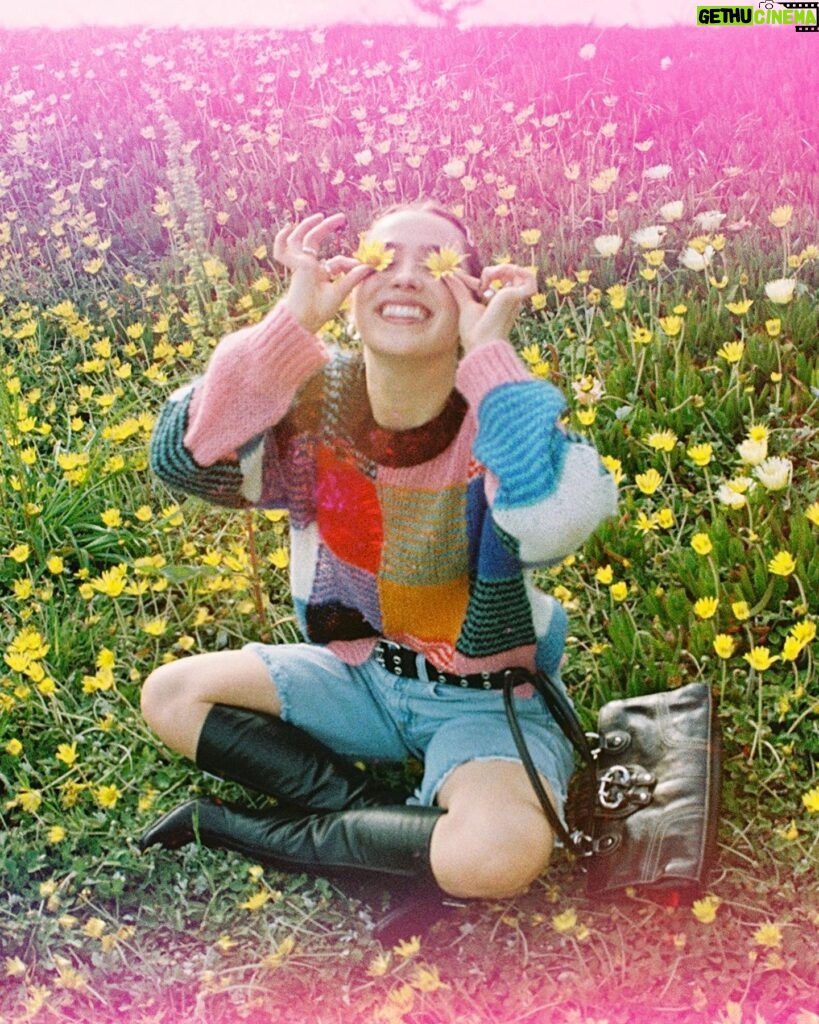 Haley Lu Richardson Instagram - Just me bein silly on a rock and in some flowers wearin a cutie outfit from @thredUP asking you to thrift if you have a shopping addiction like me cause it’s better for the planet and it’s a BLAST peace out babies happy almost earth day weeee!!!!!! #thredUPpartner