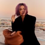 Haley Lu Richardson Instagram - I have admired and physically stalked Aubrey Plaza for years and now I am on the same television show as her and she interviewed me for a magazine and she was hiding in this bag during the photoshoot with a knife and a diaper you can check out the full and very chaotic conversation at @interviewmag and man this is my favorite run on sentence I have ever typed.