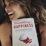 Halle Berry Instagram - It’s time for #HBBooksFromBed! A dear friend gave me ‘Stumbling on Happiness’ recently, and I have to say it piqued my interest. Do you ever wonder why you don’t feel happy even though you continually try? Well, this is a quick, easy read that answers that question. While no book can make you happy (that’s a solo job), ‘Stumbling on Happiness’ will help you understand how our brains work and how we can predict if the future will make us happy or not. It’s an interesting read that will spark hours of dinner-table fun and debate. Enjoy! And happy #WorldBookDay! 📚