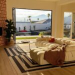 Hannah Simone Instagram – 🌵🌞 This is the perfect desert retreat to stay at in Palm Springs, California. Bring your besties, loved ones, or have a solo vacay to experience #CasaPomelo in the Palm Springs desert. 

𝗦𝗮𝘃𝗲 𝘁𝗵𝗶𝘀 𝗳𝗼𝗿 𝘆𝗼𝘂𝗿 𝗻𝗲𝘅𝘁 𝘃𝗮𝗰𝗮𝘁𝗶𝗼𝗻!

[ about this @sunstonehomes vacation rental ]
〰️ 10-foot ceilings throughout the home with sliding doors that open to the backyard
〰️ custom gallery wall & insta-moments throughout the house
〰️ living room with a fireplace and sliding door that opens up to the backyard
〰️ 80” Samsung Frame Smart TV (and yes, smart TVs in each bedroom)
〰️ newly built swimming pool/spa (FREE heating to 80F) with 20-person hot tub & umbrellas

𝗦𝗵𝗮𝗿𝗲 𝘁𝗵𝗶𝘀 𝘄𝗶𝘁𝗵 𝘀𝗼𝗺𝗲𝗼𝗻𝗲 𝘄𝗵𝗼 𝗻𝗲𝗲𝗱𝘀 𝗮 𝘃𝗮𝗰𝗮𝘁𝗶𝗼𝗻

[ things to do nearby ]
〰️ 3 minutes to spas like Two Bunch Palms & Azure Palm Hot Springs
〰️ 17 minutes to downtown Palm Springs
〰️ 17 minutes to Agua Caliente Resort Casino

🌞 DM to book with special pricing 

#palmsprings #vacationrental #vacationhome #vrbostay #airbnbrental #visitpalmsprings #sunstonehomes #sunstonehomesrentals #placestovacation #wheretostay #placestostay #dreamyvacationrentals
