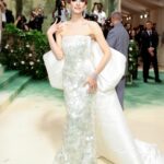 Hari Nef Instagram - my second #metgala—and nothing compares. @voguemagazine, anna wintour, and andrew bolton: thank you as ever for including me i wore custom @hm with a corset underneath by the legendary @misterpearlofficial the met's dress code this year, 'the garden of time,' samples its name from a short story by j.g. ballard. it's a fanciful little allegory which, the way i saw it, unmines the tension between the future and the past this lead me to think about high glamour: how it looks, why it looks like that, where it comes from. i took my 'avedon fashion' book off the shelf, opened it up. i locked onto margot mckendry in the background of a photo from 1961 (slide 3). she reminded me of crystal labeija (slide 5) in frank simon's 1968 documentary 'the queen,' which goes behind the scenes of a manhattan drag pageant (in 1968, dressing in drag was effectively illegal). so i thought about how the visual ideal of glamour travels, from high society to its fringes—and all the way through the decades. what does it mean for me, a card-carrying member of "the new world" (and you know exactly what i mean) to evoke the glamour of the old world? and what did it mean for my sisters who came before me? their beauty and grandeur moves me; i reflect on what they risked for it. i wanted to honor them last night thank you @chrishoran20 for your vision and hustle and for keeping me on best dressed lists—and occasionally worst-dressed lists, which is always cooler! no one does it like you thank you to @hairbyorlandopita and @yadim for sanctifying me from the neck up. i can't believe i get to be coiffed and beat by such absolute mavericks. yadim used @valentino.beauty...i hear there are some exciting things going on over at maison valentino in the near future ;) thank you to @aarondnewbill and @meansss at @imgmodels for keeping me in fashion. i love you and congratulations to @condeunited who won the day :)