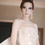 Hari Nef Instagram - my second #metgala—and nothing compares. @voguemagazine, anna wintour, and andrew bolton: thank you as ever for including me i wore custom @hm with a corset underneath by the legendary @misterpearlofficial the met's dress code this year, 'the garden of time,' samples its name from a short story by j.g. ballard. it's a fanciful little allegory which, the way i saw it, unmines the tension between the future and the past this lead me to think about high glamour: how it looks, why it looks like that, where it comes from. i took my 'avedon fashion' book off the shelf, opened it up. i locked onto margot mckendry in the background of a photo from 1961 (slide 3). she reminded me of crystal labeija (slide 5) in frank simon's 1968 documentary 'the queen,' which goes behind the scenes of a manhattan drag pageant (in 1968, dressing in drag was effectively illegal). so i thought about how the visual ideal of glamour travels, from high society to its fringes—and all the way through the decades. what does it mean for me, a card-carrying member of "the new world" (and you know exactly what i mean) to evoke the glamour of the old world? and what did it mean for my sisters who came before me? their beauty and grandeur moves me; i reflect on what they risked for it. i wanted to honor them last night thank you @chrishoran20 for your vision and hustle and for keeping me on best dressed lists—and occasionally worst-dressed lists, which is always cooler! no one does it like you thank you to @hairbyorlandopita and @yadim for sanctifying me from the neck up. i can't believe i get to be coiffed and beat by such absolute mavericks. yadim used @valentino.beauty...i hear there are some exciting things going on over at maison valentino in the near future ;) thank you to @aarondnewbill and @meansss at @imgmodels for keeping me in fashion. i love you and congratulations to @condeunited who won the day :)